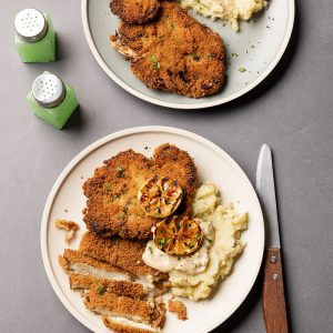 Cauliflower schnitzel with mustard sauce and mashed potatoes sliced and gorgeous