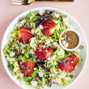 Vegan strawberry feta salad with almond feta and maple dijon dressing
