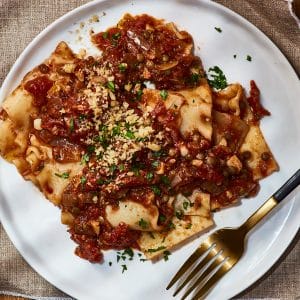 Vegan lentil bolognese with walnut smothered over lasagna moodles