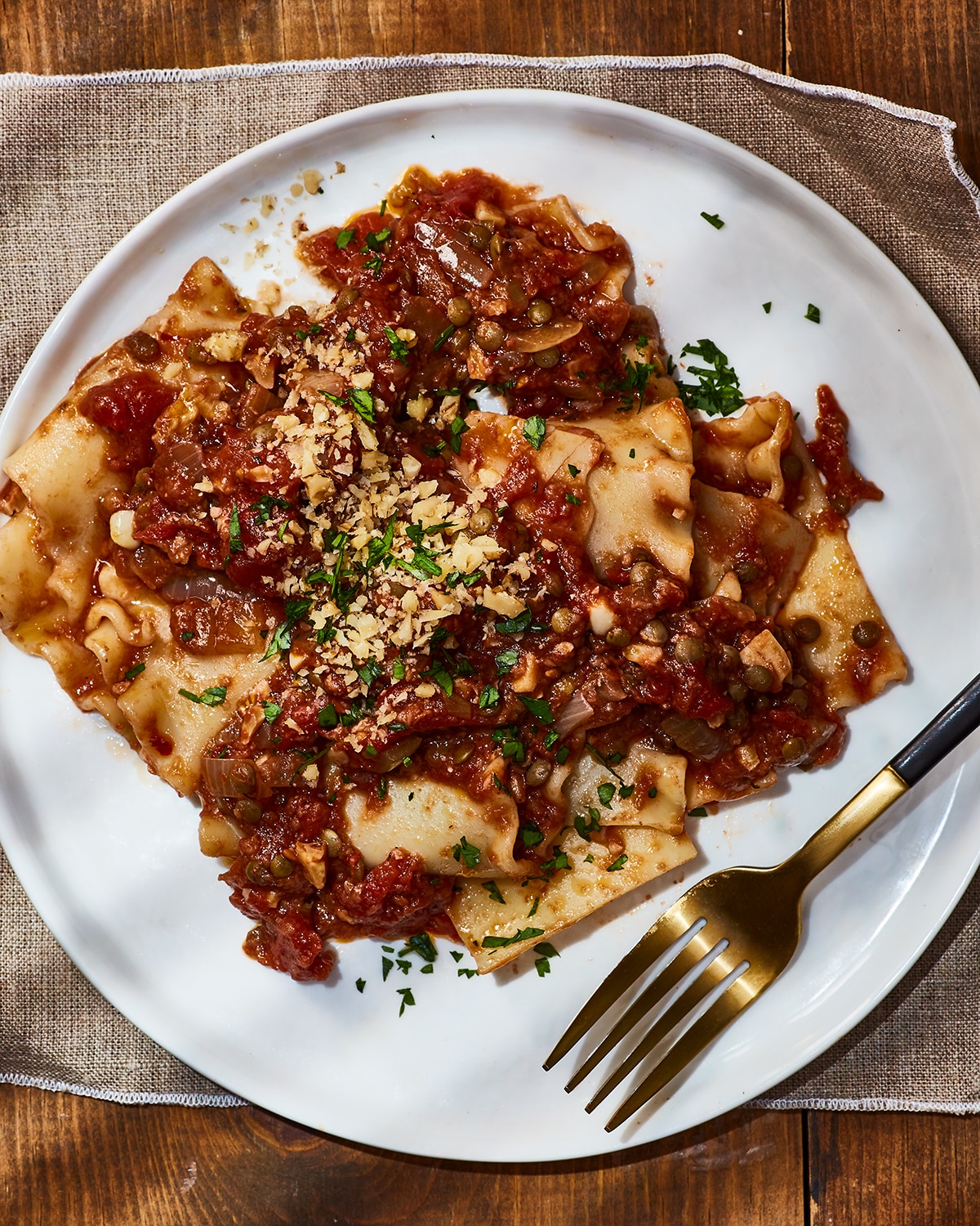 Vegan lentil bolognese with walnut smothered over lasagna moodles