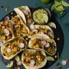 Vegan potato tacos with black beans and guacamole