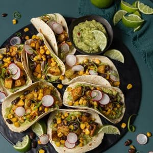 Vegan potato tacos with black beans and guacamole