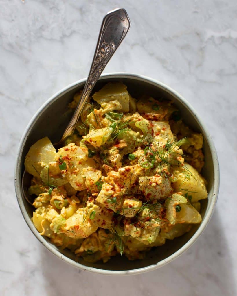 Vegan eggy potato salad recipe in a bowl
