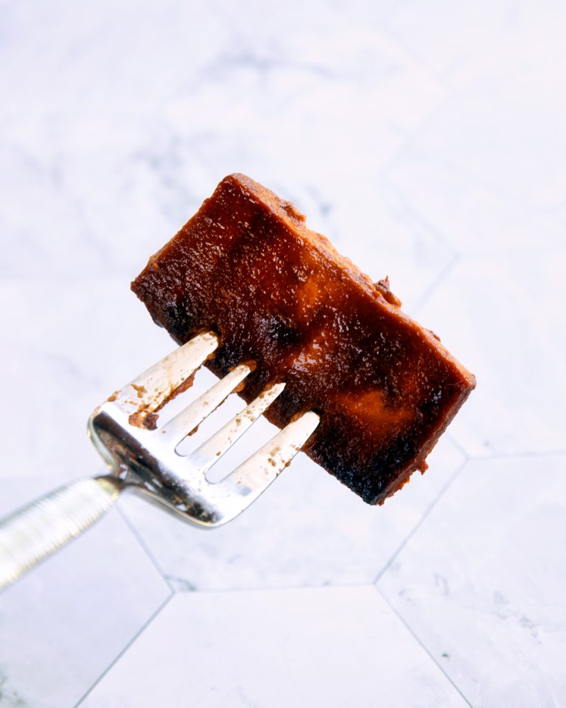 Baked BBQ tofu on a fork