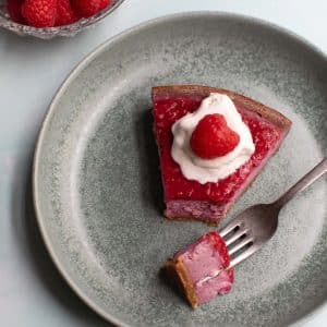 Vegan raspberry cheesecake with whipped topping