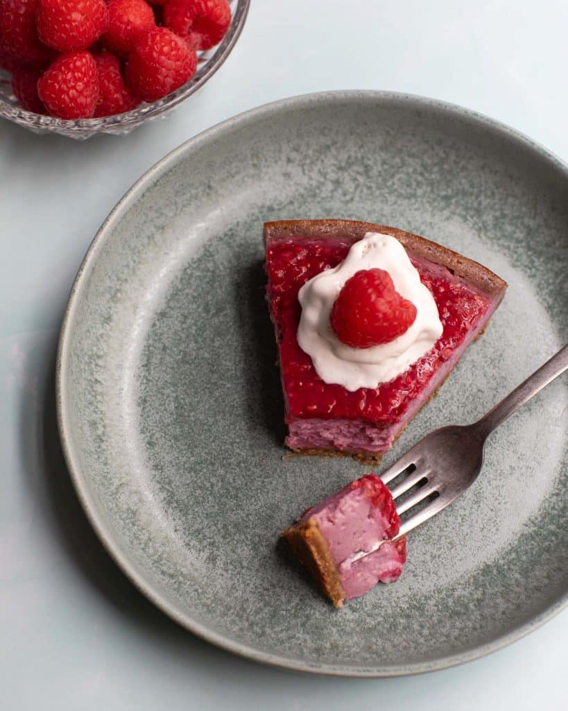 Vegan raspberry cheesecake with whipped topping
