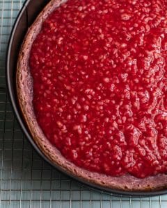 Vegan raspberry cheesecake with topping